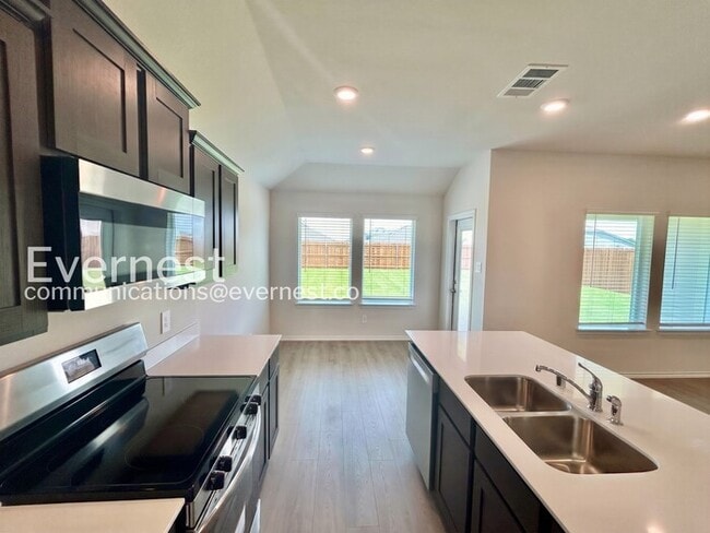 Photo - Modern Living with Fenced Yard and Garage Access / 3 Bed & 2 Bath / Available Now!