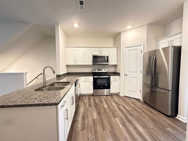 Photo - 3 Bedrooms 1 Garage & Open space one the Main Floor