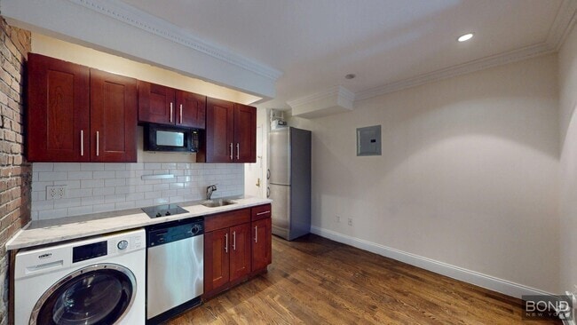 Building Photo - 610 E 9th St Unit 16 Rental