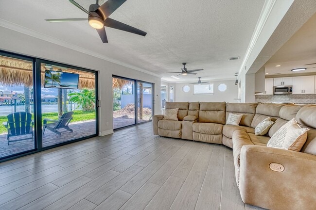 Photo - Treasure Island Three Bedroom, Two Bath Furnished Single Family Home on the water.