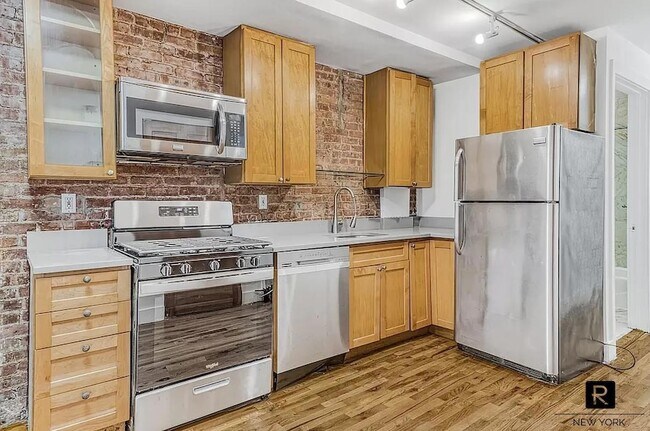 Photo - 533 W 149th St Unit Garden