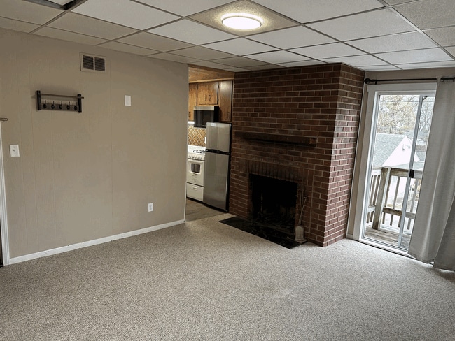 Leaving room with the fireplace - 834 S Walnut St Unit 834R S. Walnut