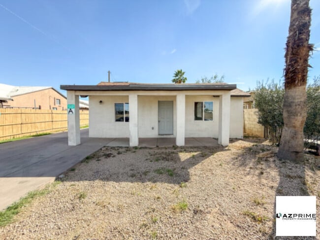 Photo - $1000 OFF FIRST MONTH RENT MOVE IN SPECIAL! Discover this Charming 5/2 Phoenix House!