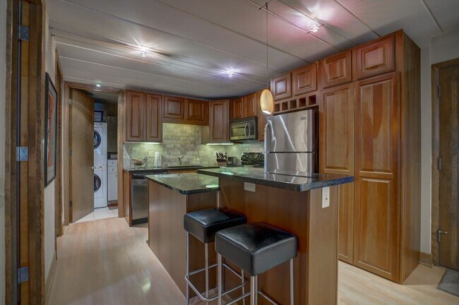 Beautiful kitchen area with plenty of storage! - 2051 Allen Blvd Apartments Unit 201