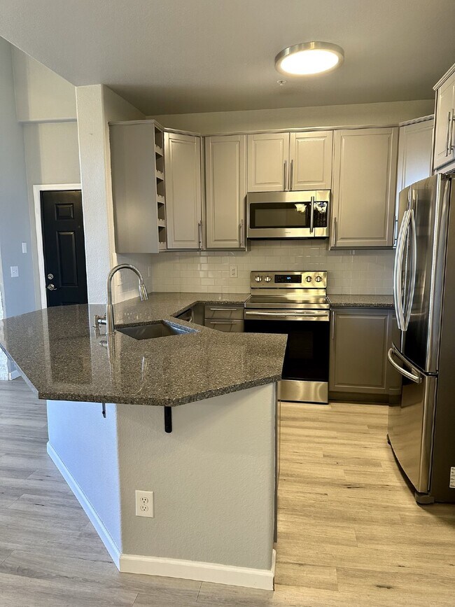 Don't Miss This Stunning Top Floor Unit in Littleton, CO! Stunning View From Private Balcony!!