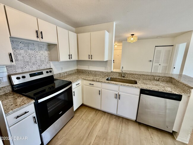 Photo - 940 Village Trail Unit 8-205