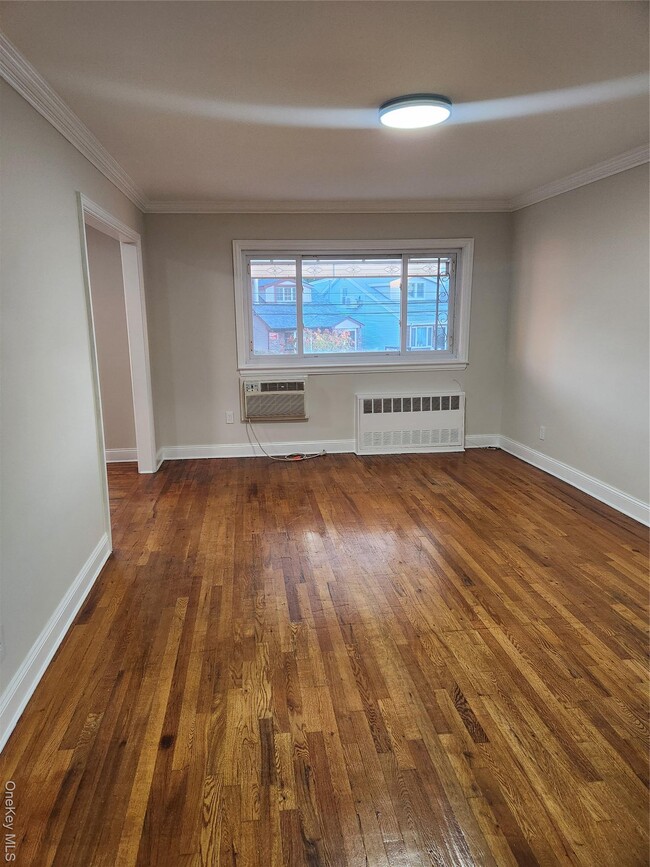 Building Photo - 71-33 Caldwell Ave Unit 2