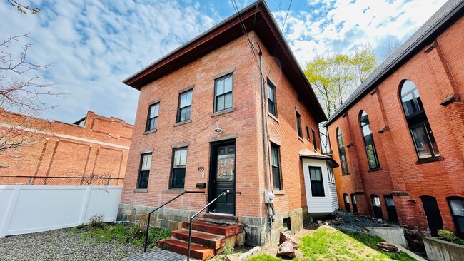 Building Photo - Two-Storey Historic Brick Townhouse in Eas... Unit TH