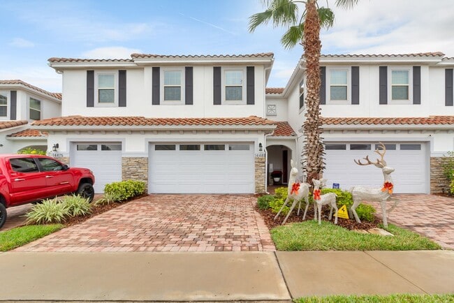 Building Photo - Beautiful 3-Bedroom Townhome in Gated Eagle Creek Golf Community – Lake Nona