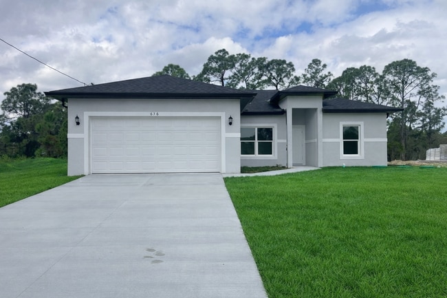 Building Photo - JUST BUILT! Move-In Ready 4 Bed / 2 Bath / 2 Car Garage in Lehigh Acres