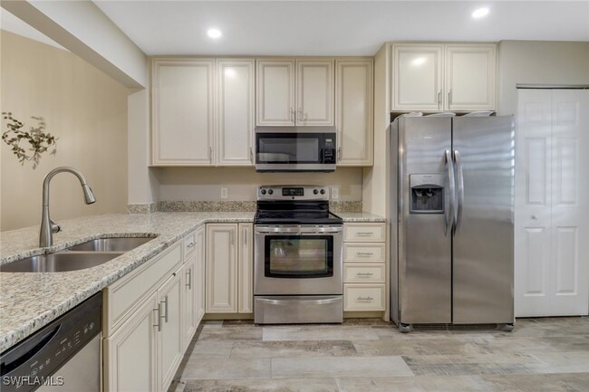 Building Photo - 3002 Sandpiper Bay Cir Unit A305 Rental