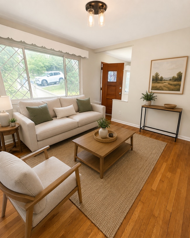 Photo - Charming 3-Bedroom Home with Hardwood Floors, Garage & Private Patio