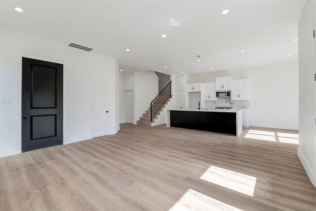 Photo - "Charming 3-Bed Oasis with 2.5 Baths & 1,707 Sq Ft in Houston's Heart!"