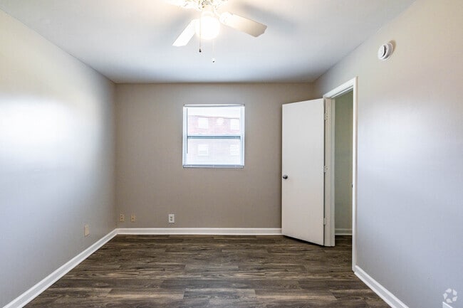 2BR, 1BA - 750SF - Primary Bedroom - Village on the Green