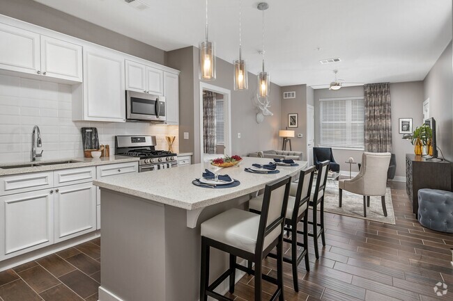 Gourmet Kitchens w/ Eat-In Island - 500 Station Apartments