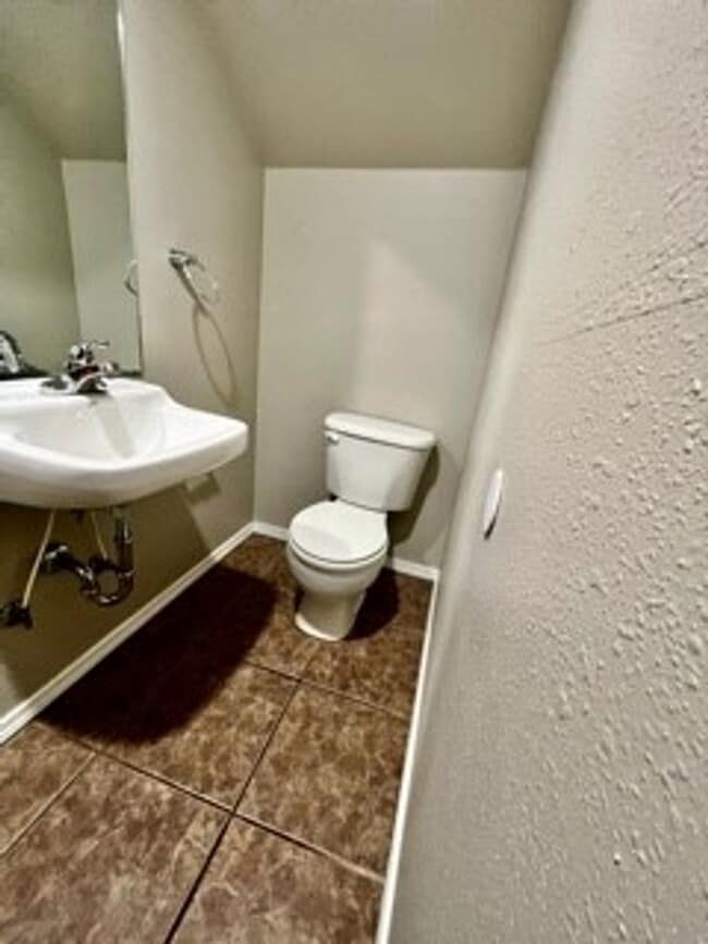 Photo - Spacious 3-Bed, 2.5-Bath Fourplex with Gar...