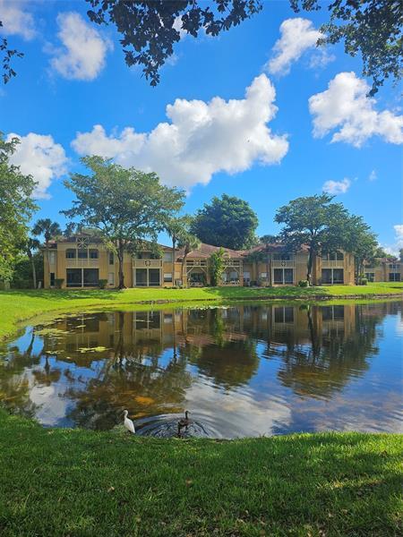 Building Photo - 4831 Via Palm Lakes Unit 1202