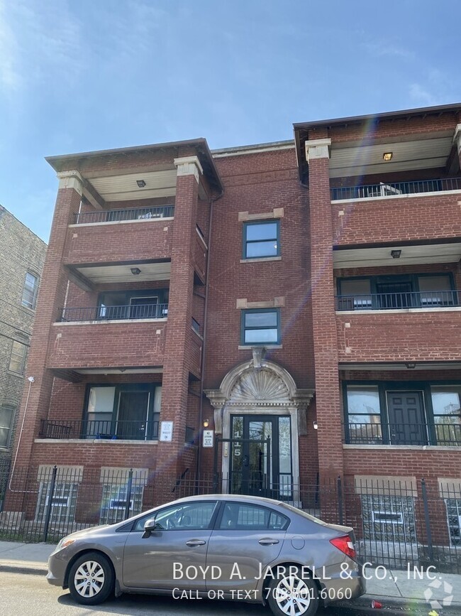 Building Photo - 113 E 57th St Unit 1st Rental