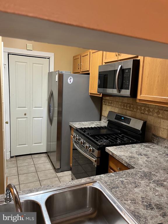 Building Photo - 9001 Groffs Mill Dr Unit 9001 Rental