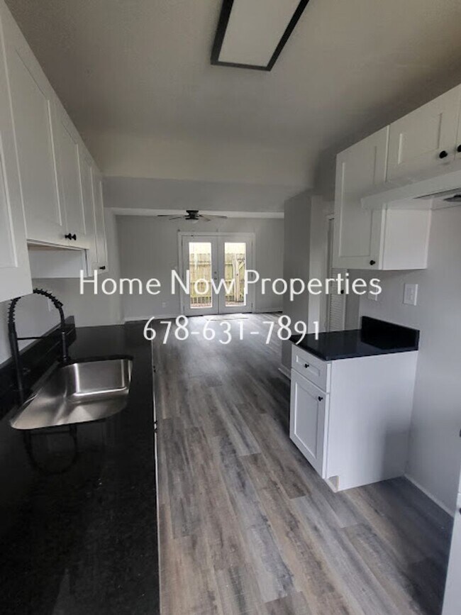 Photo - Modern Townhome w/ Granite Kitchen + Fenced Yard – Move-In Ready