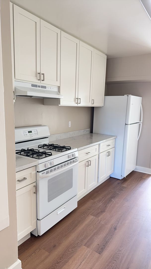 Photo - Bright Sunnyside Home with Fireplace, Bay Windows & Private Backyard!
