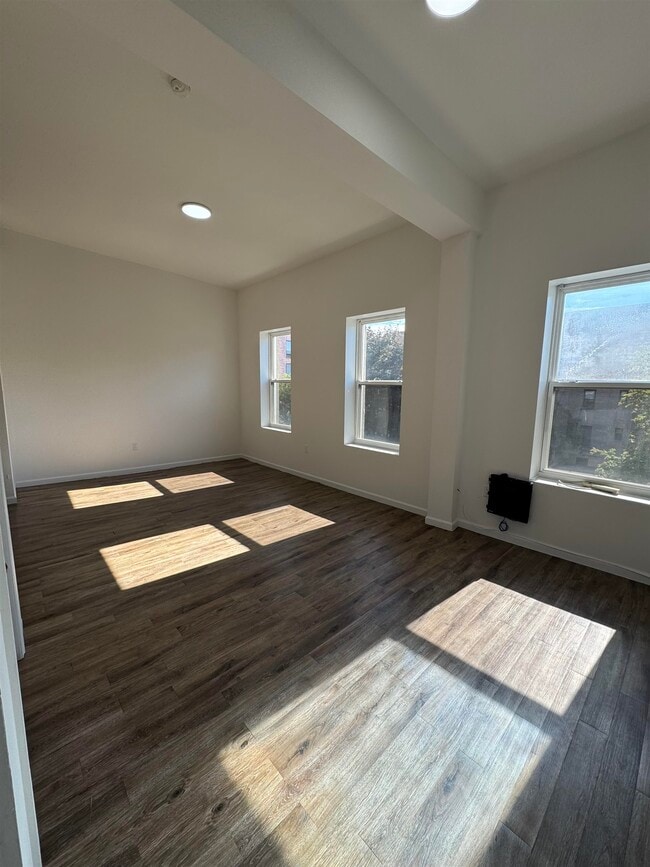 Building Photo - 517 Communipaw Ave Unit 3C