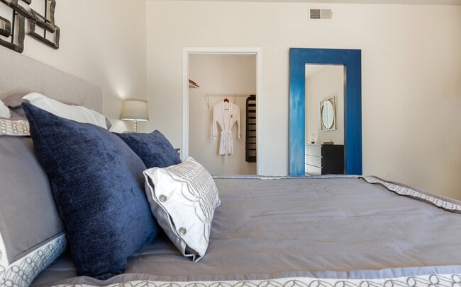 The closet opens directly off the bedroom rather than a shared hallway.