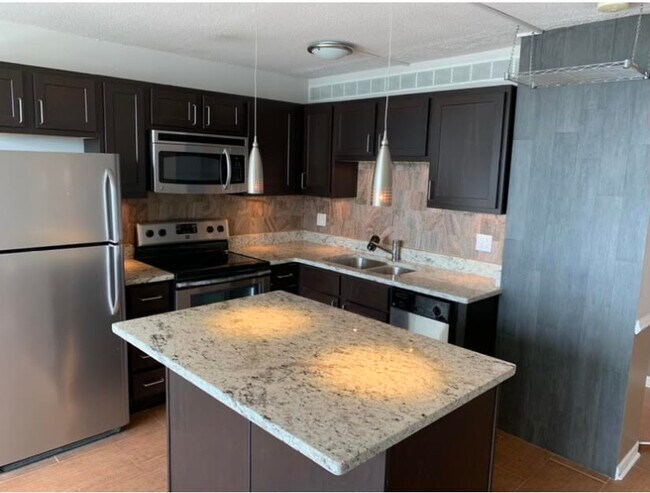 Building Photo - 2728 N Hampden Ct Unit 1604