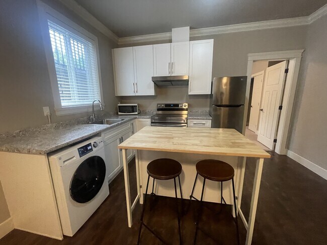 Photo - 16323-1626A 26a Ave