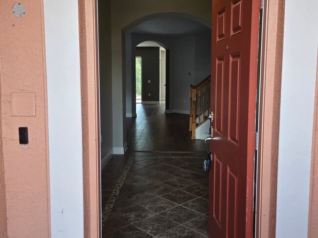 Photo - Freshly Painted 4BR/2BA Pool Home with Screened Pool & Spa – Move-In Ready!