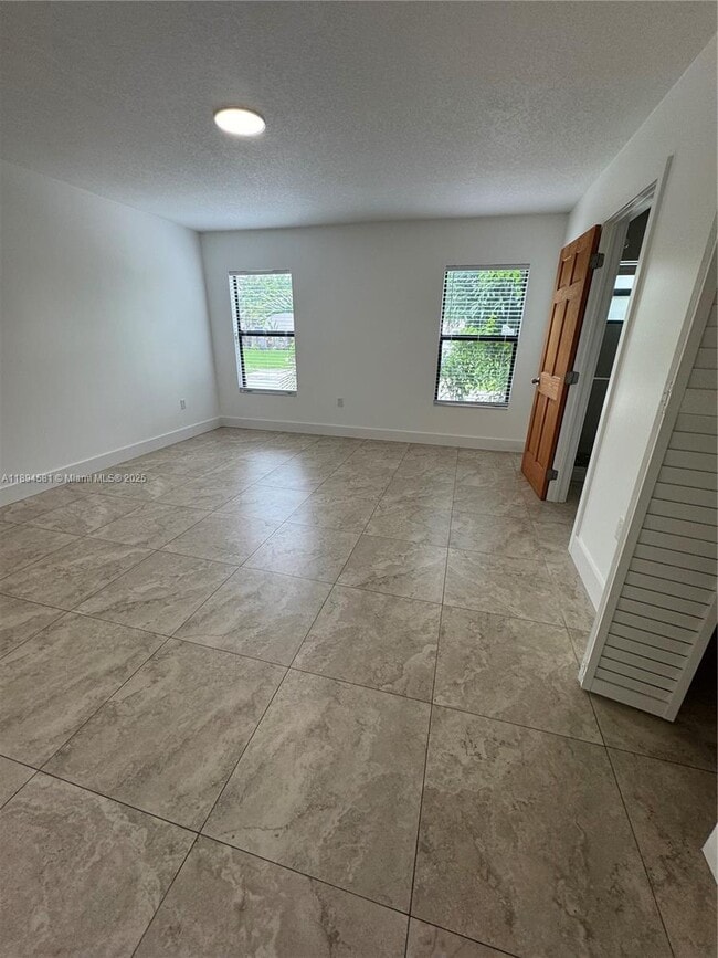 Building Photo - 15730 SW 103rd Ave Unit X