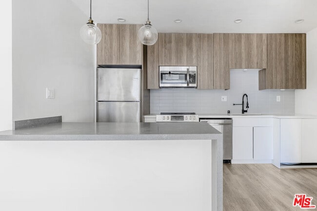 Photo - 6350 Willoughby Ave Unit 12