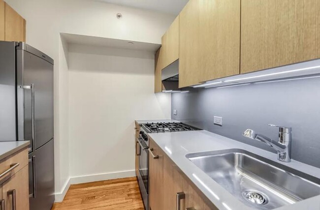 Photo - 113 W 15th St Apartment Unit 104