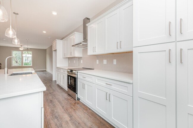 Photo - Beautiful 3BR 2.5BA Townhome w/ Full Appliance Kitchen • Garage Parking • Ultra-Modern