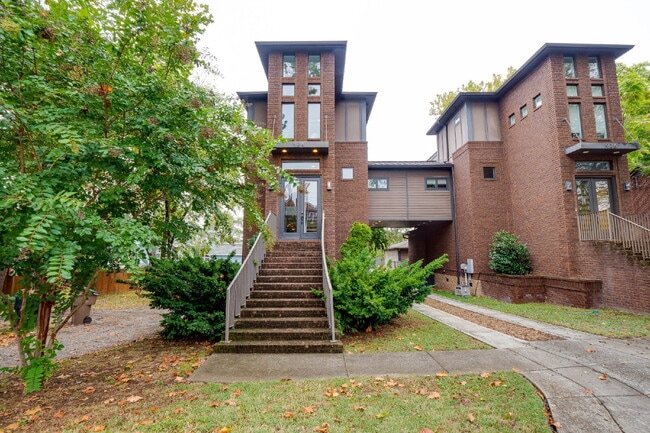 Photo - Luxury 12 South Brownstone with Courtyard | Rooftop Deck with Fireplace & Scenic Views | 2-Car Ga...