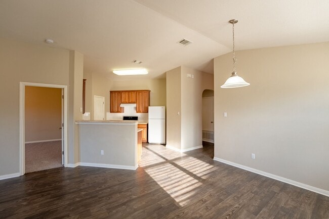 Photo - Charming Brick Home with Open Floorplan, Vaulted Ceilings, and Luxurious Amenities—Perfect for An...