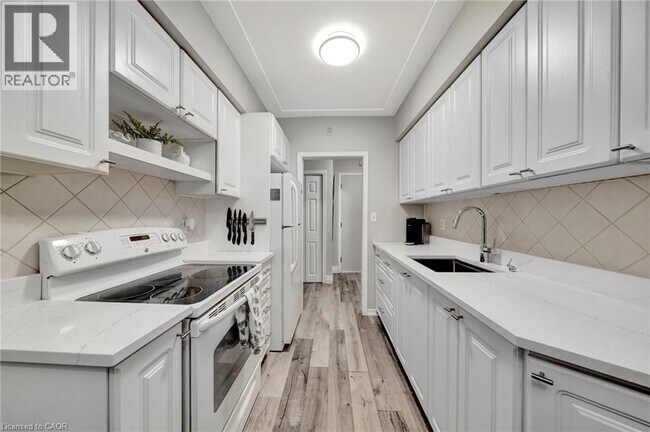 Photo - 11 Woodman Dr S Unit 307