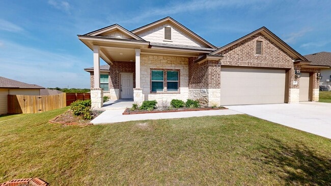 Photo - Discover this spacious 4-bedroom, 2-bath home with 3 CAR GARAGE!!!