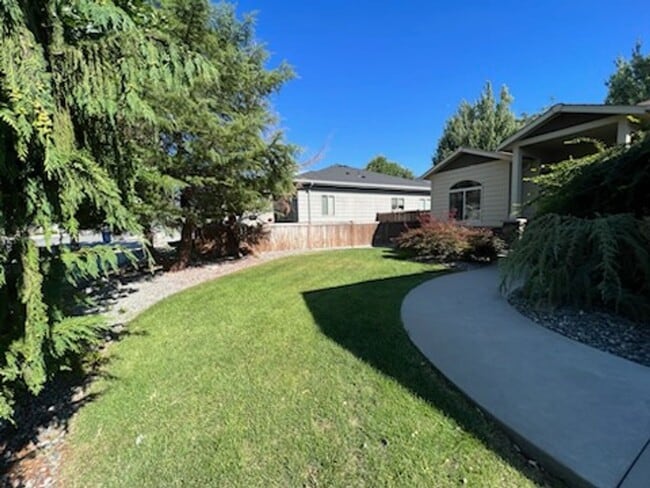 Photo - Beautiful 4 bed/2 bath home in excellent location, with a 3 car garage!