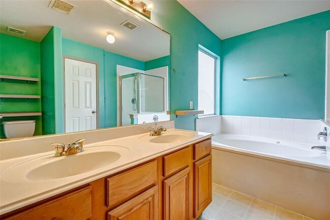 Photo - This one-story, three-bedroom, two bath ho...
