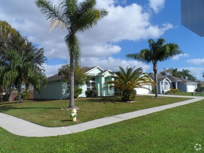 Building Photo - 4 BEDROOM - GATED TWIN LAKES SUBDIVISION -... Rental