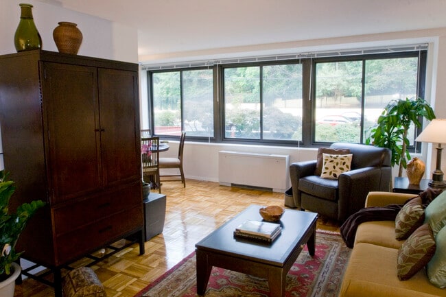 Living and dining areas with parquet flooring
