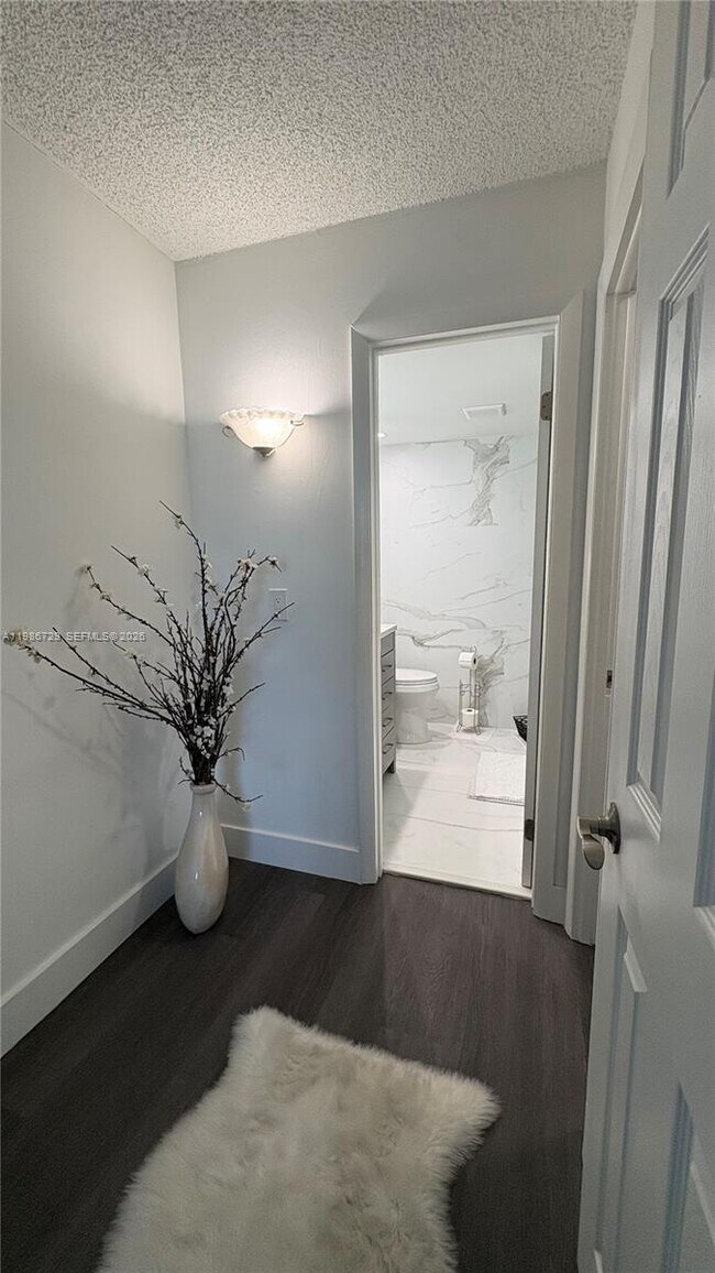 Photo - 299 NW 52nd Terrace Unit PH-X