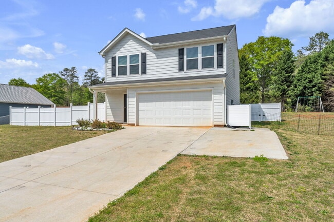 Photo - Stunning 3BR/2.5BA Home | Private Fenced Yard & Outdoor Oasis $2190/mo rent