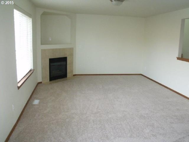 Photo - Spacious 4 Bedroom Home w/ Fully Fenced Yard & 2 Car Garage!