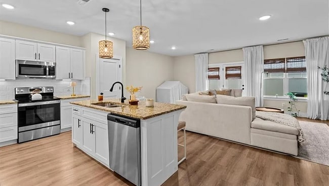 Photo - Like new modern maintenance free 3 bedroom 2.5 bath townhouse in Greensboro. Lawn care included.