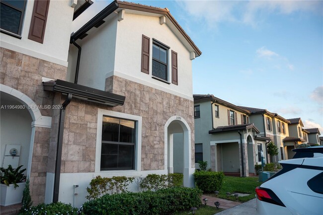 Building Photo - 11091 W 32nd Ln