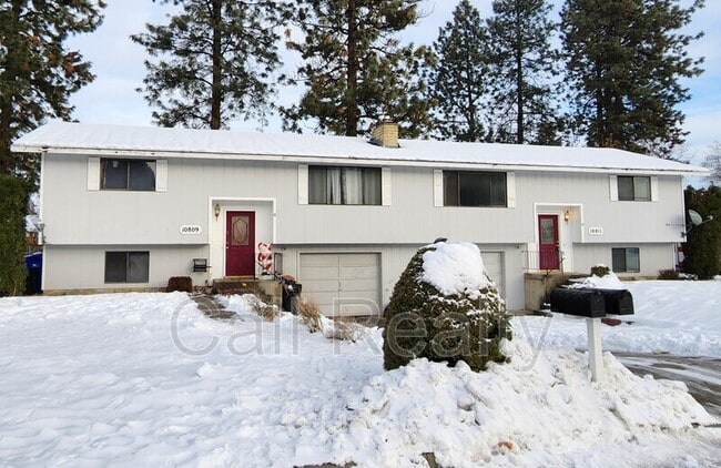 Building Photo - 10811 E 26th Ave