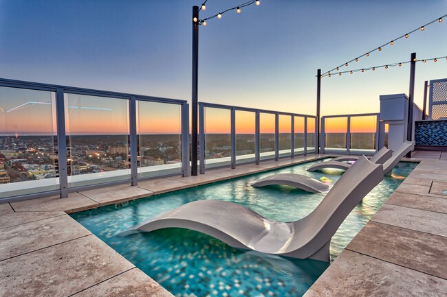 Plunge pool with ledge loungers for ultimate relaxation