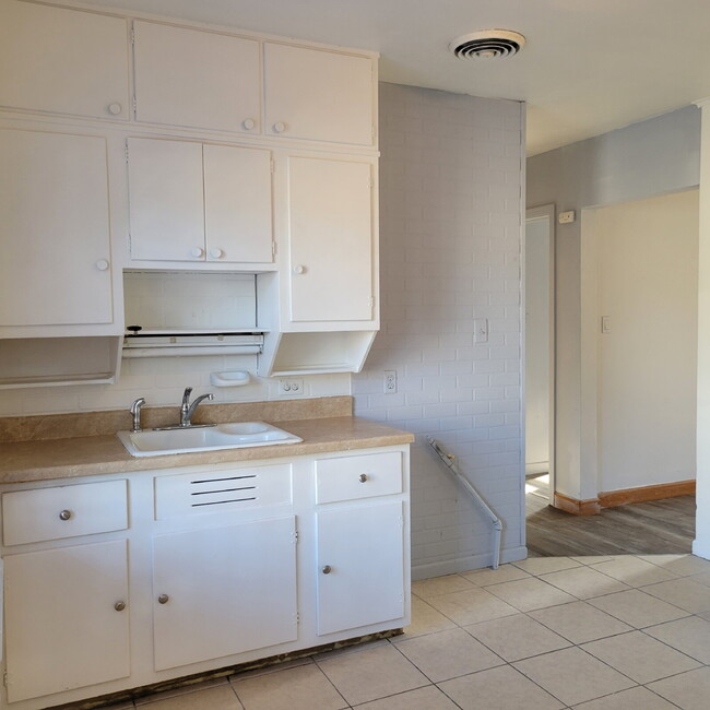 Photo - Highway to Home: Rent this 'Neighborly Oasis' 2 Bed/1 Bath with a Garage Bonus!